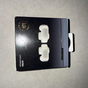 Bose Ultra Open Earbuds in Black and White